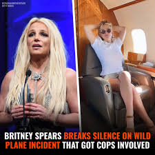 Britney Spears walking past paparazzi cameras, symbolizing arrest rumors, DUI speculation, and media attention.