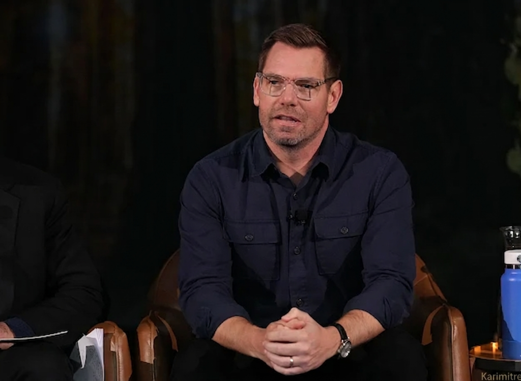 Eric Swalwell speaking at a public event as a U.S. Congressman